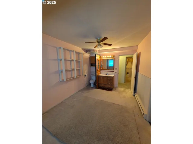 a view of livingroom with furniture and windows