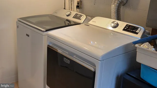 a close up of a sink washer and dryer
