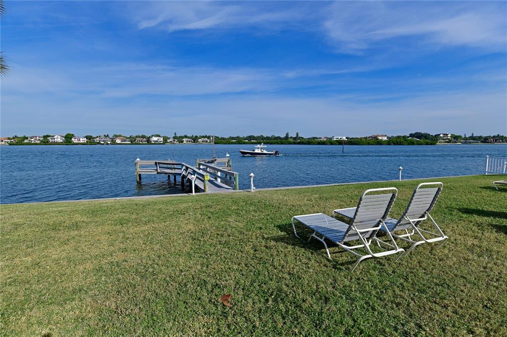 5955 Midnight Pass Road, Unit 3E Sarasota, FL 34242 - Photo 9 of 13 Fishing pier in pool area overlooking intercoastal