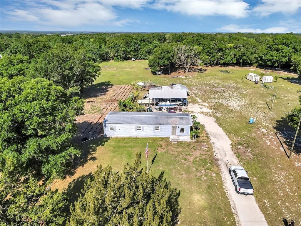 a view of a lake with a yard