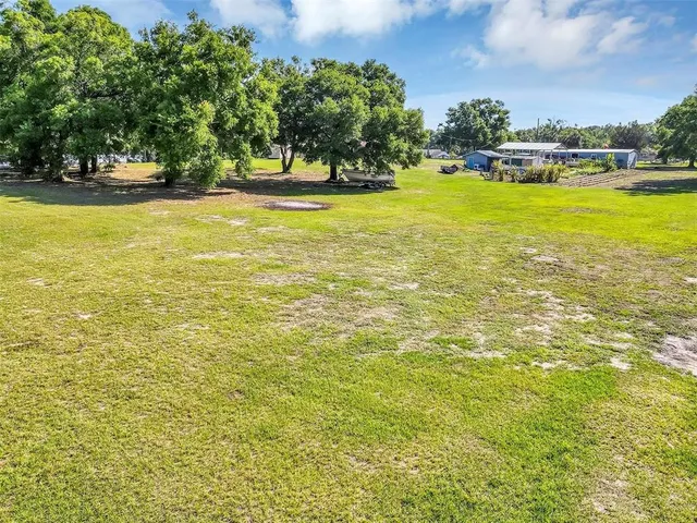 an aerial view of residential house with outdoor space