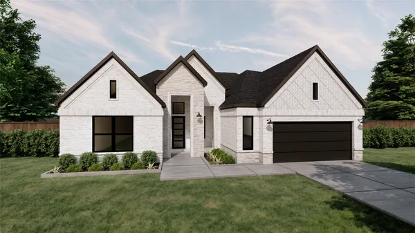 a front view of house with yard and garage