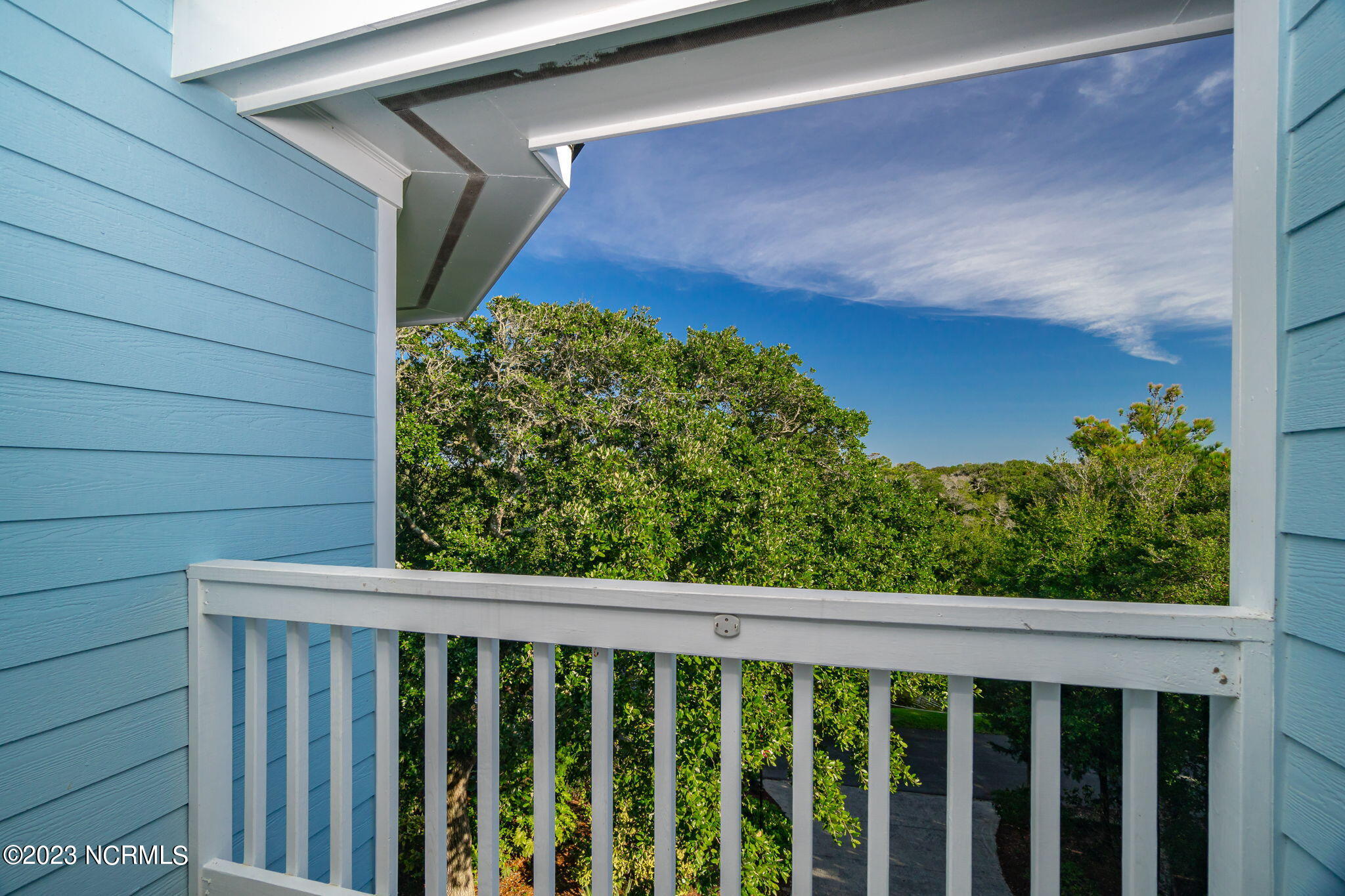 575 Coral Ridge Road Pine Knoll Shores, NC 28512 - Photo 32 of 73 Private, covered porch off guest suite