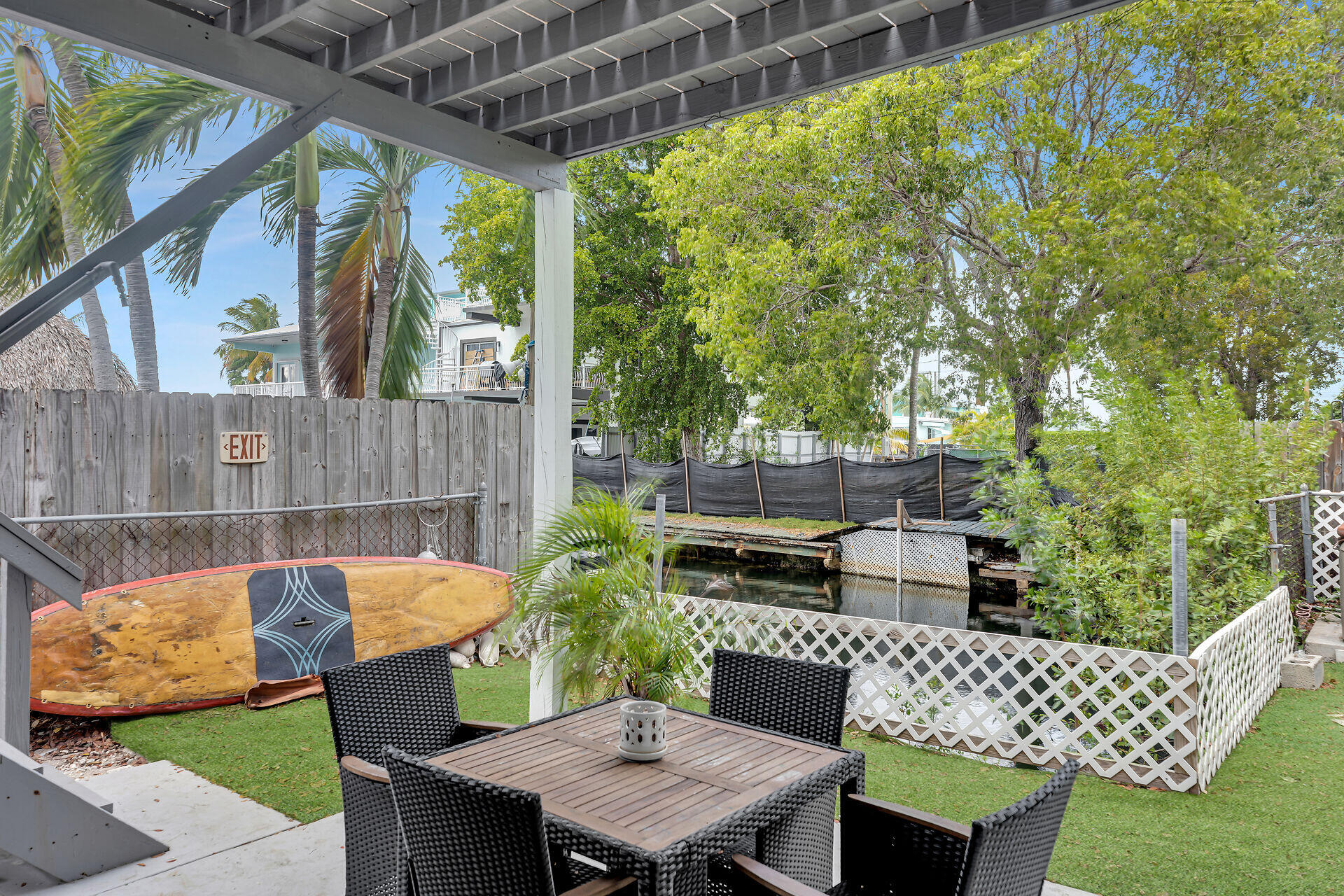 7 Avenue D Key Largo, FL 33037 - Photo 11 of 36 a view of an outdoor sitting area with furniture and garden