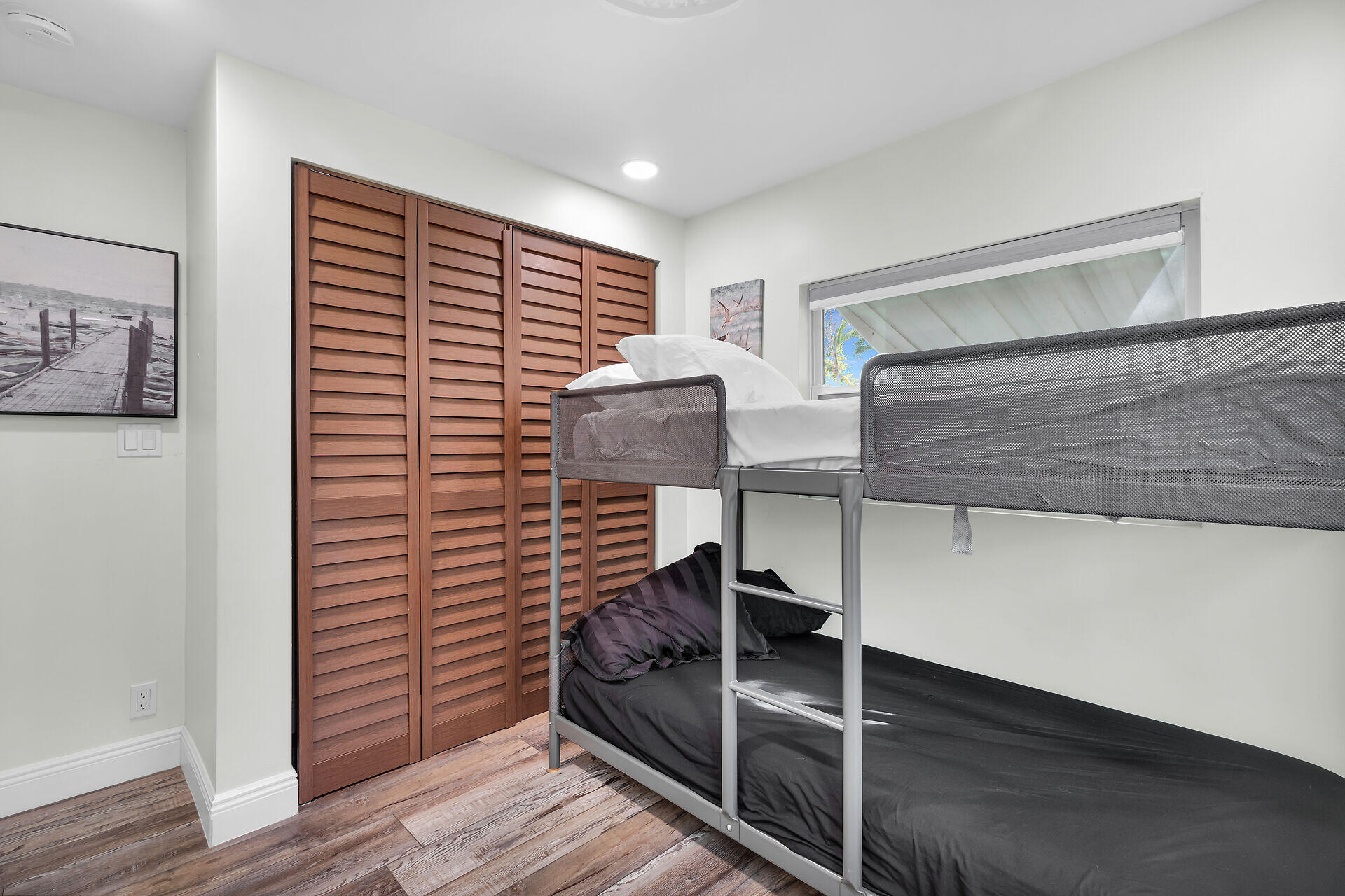 7 Avenue D Key Largo, FL 33037 - Photo 27 of 36 a balcony view with two chairs and wooden floor