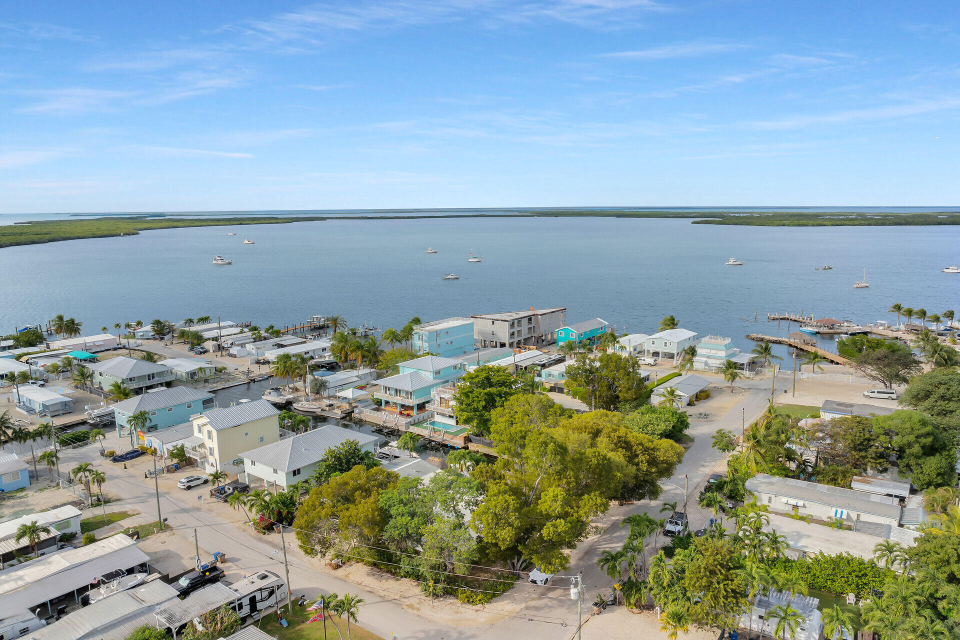 7 Avenue D Key Largo, FL 33037 - Photo 27 of 36 an aerial view of a houses with a lake view