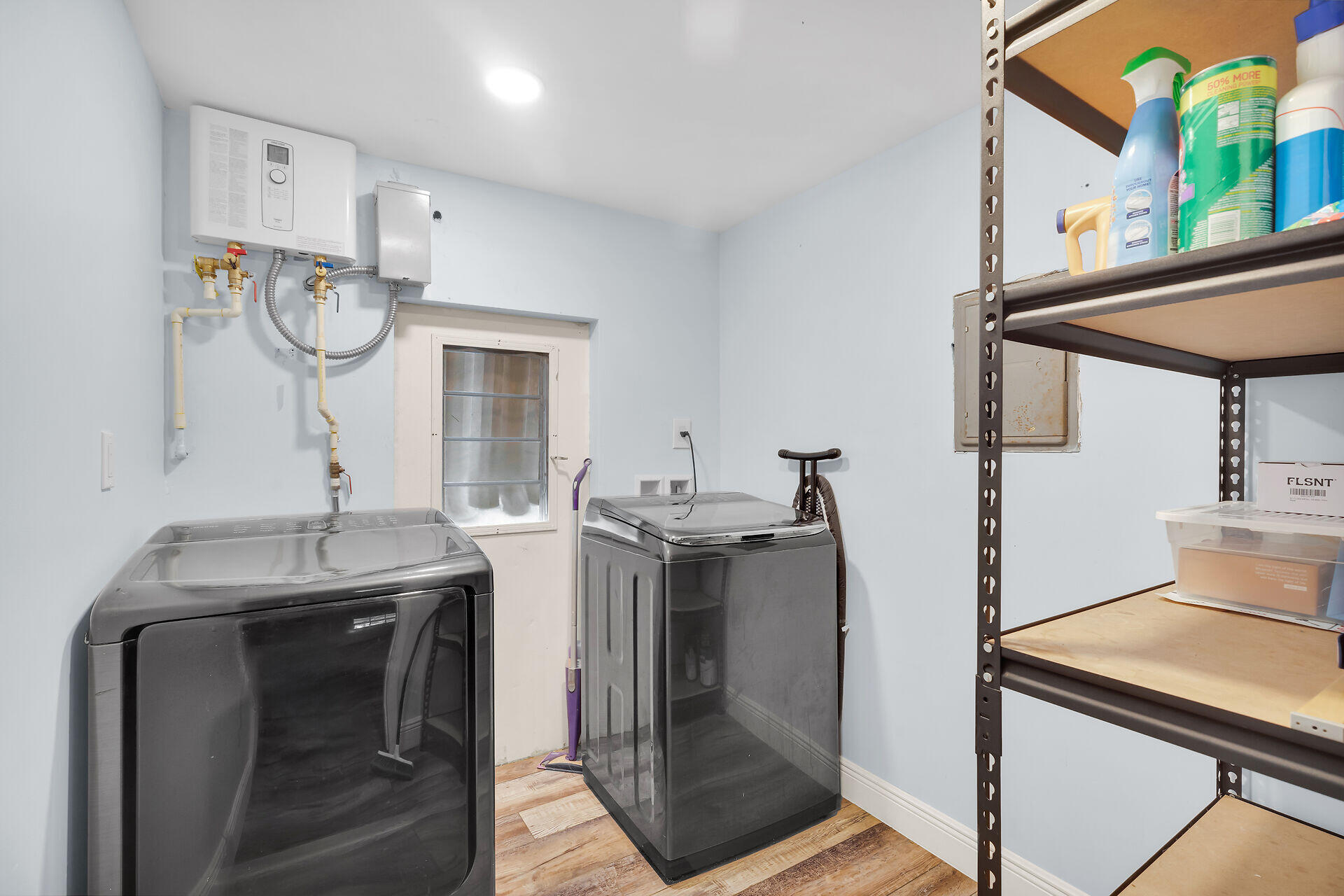 7 Avenue D Key Largo, FL 33037 - Photo 29 of 36 a kitchen with stainless steel appliances granite countertop a sink and cabinets