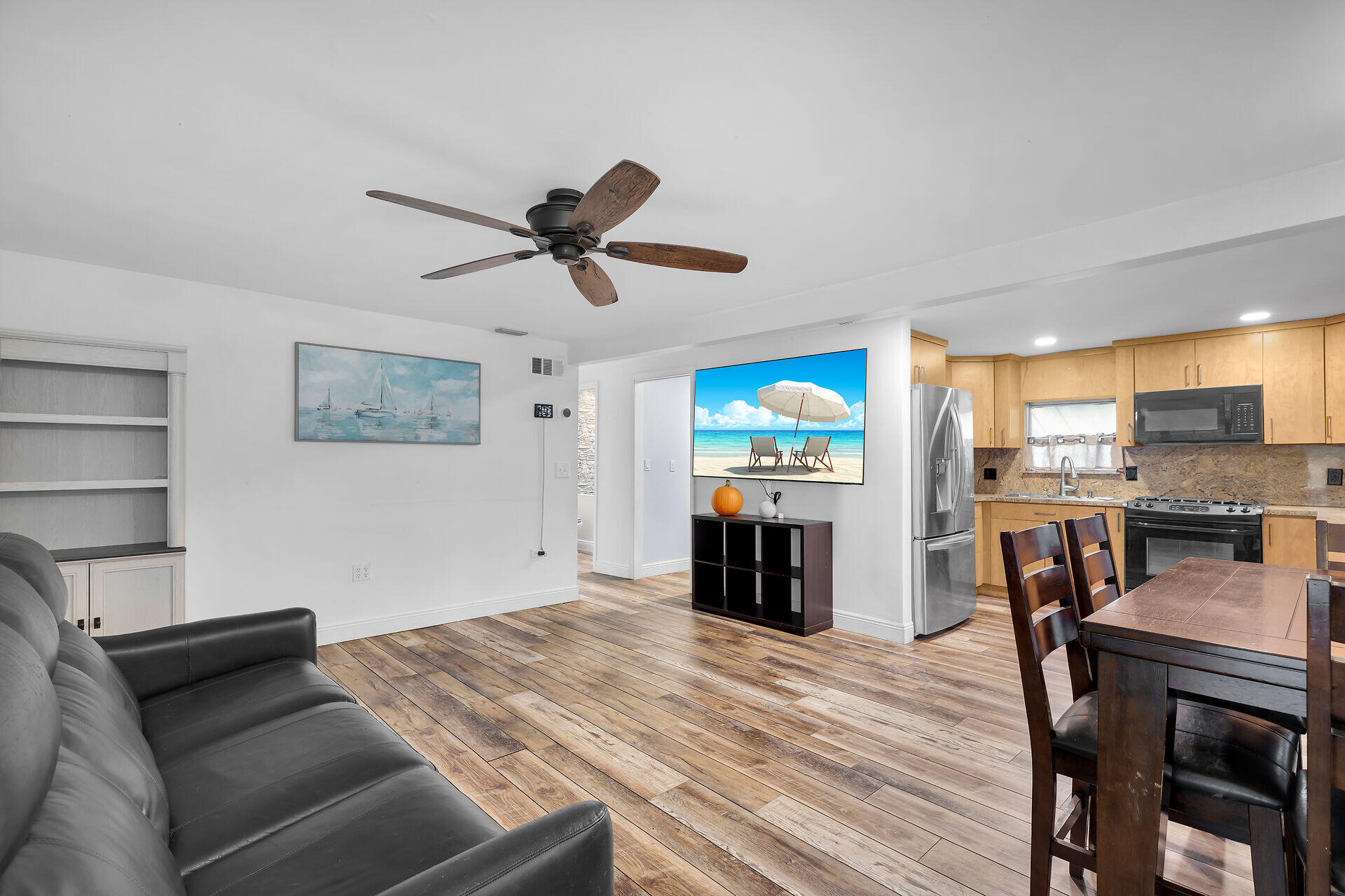 7 Avenue D Key Largo, FL 33037 - Photo 10 of 36 a living room with stainless steel appliances furniture and a kitchen view