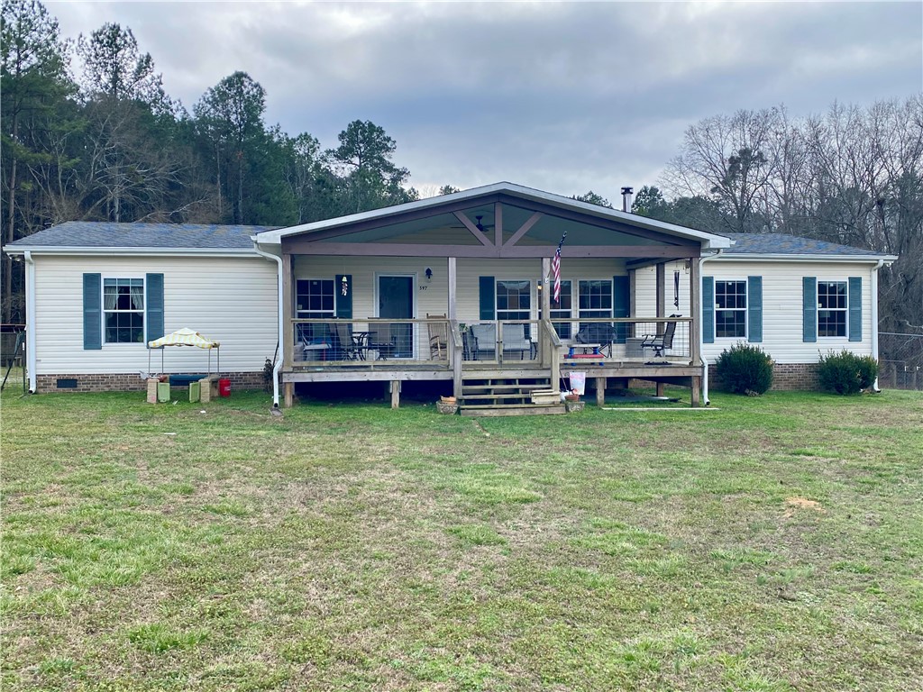 597 Sam Byrum Road Iva, SC 29655 - Photo 1 of 43 This charming residence features a welcoming covered porch, ideal for relaxation.