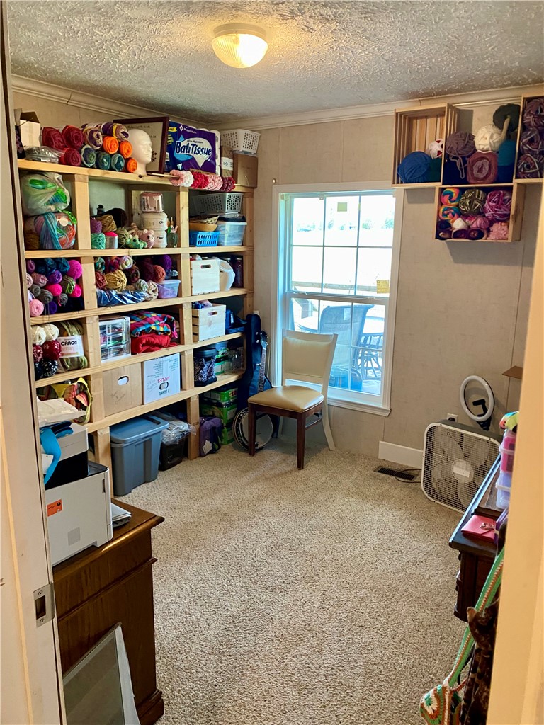 597 Sam Byrum Road Iva, SC 29655 - Photo 29 of 43 This cozy room offers ample storage and natural light.