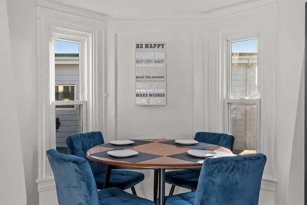 a view of a dining room with furniture