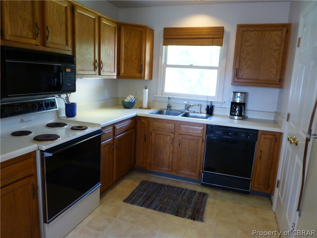 464 Jackson Creek Road Deltaville, VA 23043 - Photo 8 of 26 Kitchen with large pantry to right.