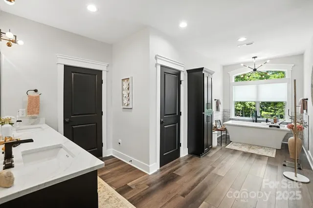 a kitchen with a refrigerator and a sink