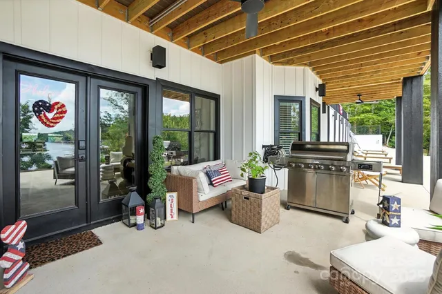 a outdoor space with patio furniture and garden view