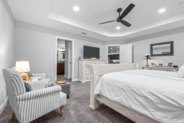 a bedroom with bed and a window