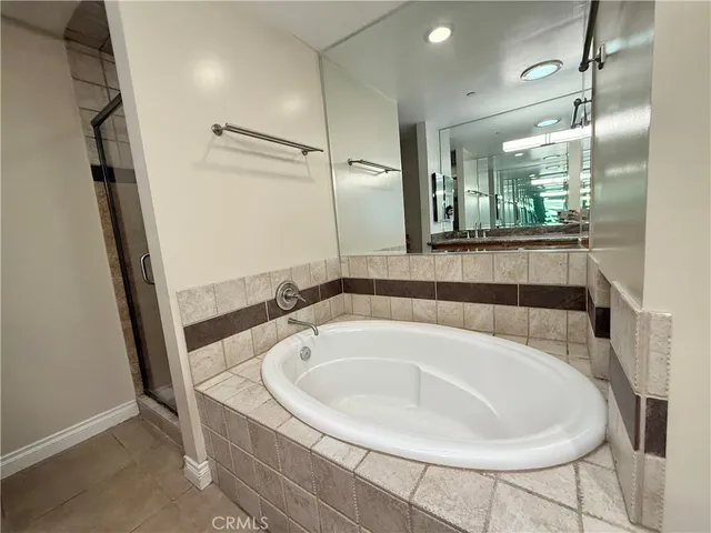 a bathroom with a bathtub and a sink