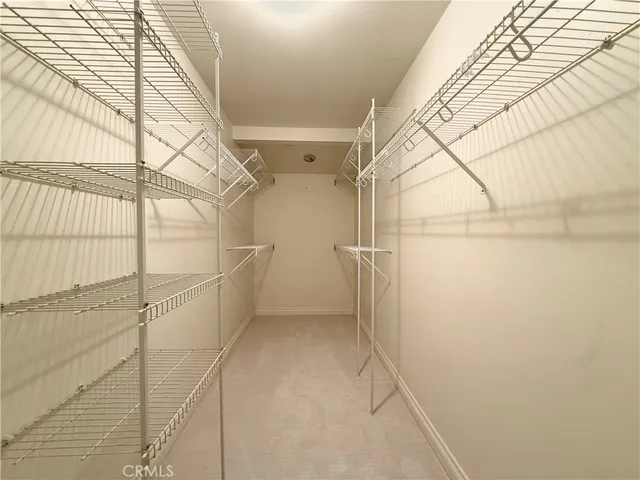 a view of a room with racks on the wall