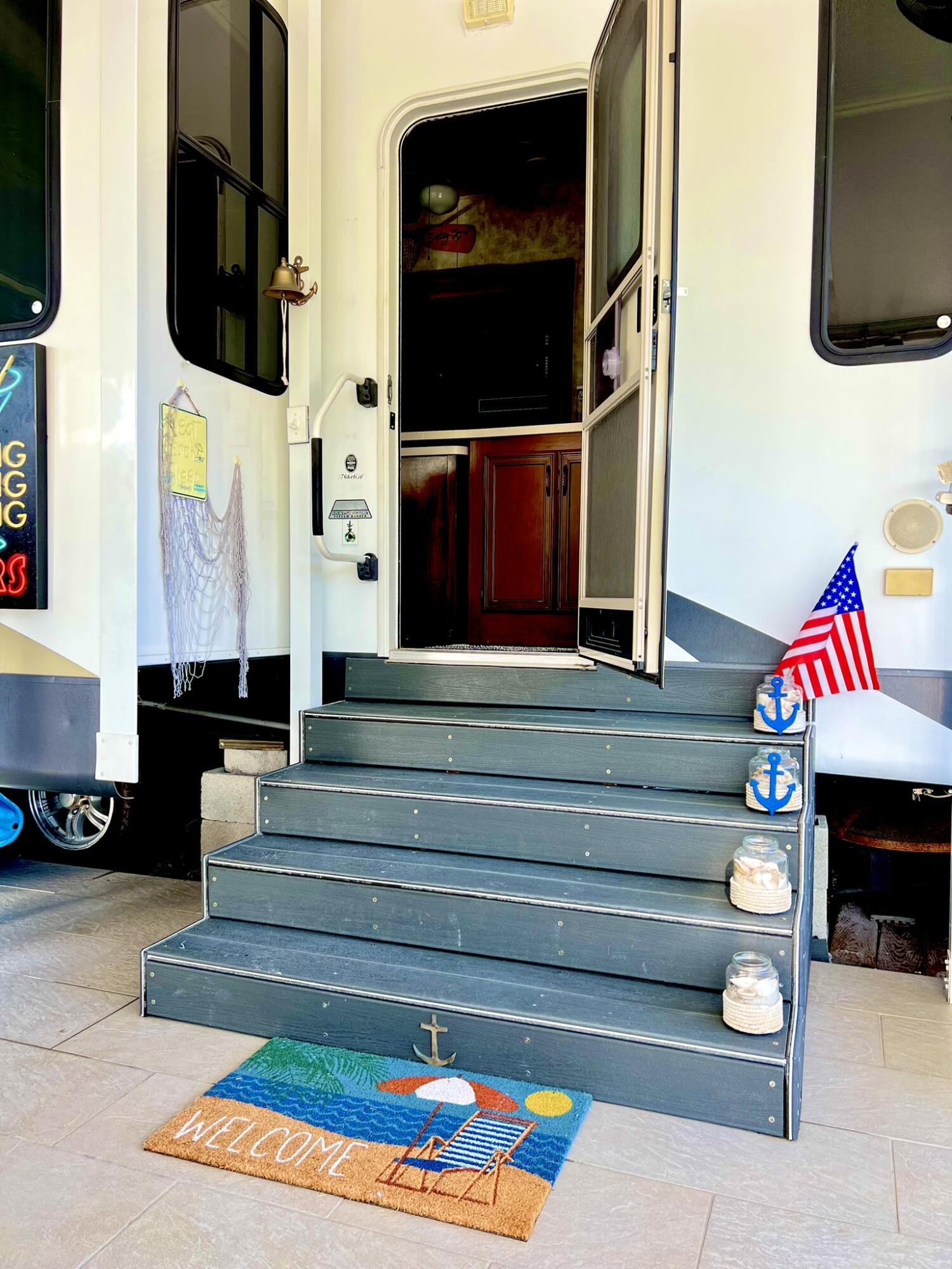 325 Calusa Street, Unit 245 Key Largo, FL 33037 - Photo 12 of 48 a living room with furniture and a flat screen tv
