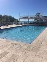 325 Calusa Street, Unit 245 Key Largo, FL 33037 - Photo 48 of 48 a view of a lake with a yard