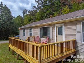 179 Fresh Water Rdg Road Whittier, NC 28789 - Photo 2 of 48 a view of house with deck and outdoor seating