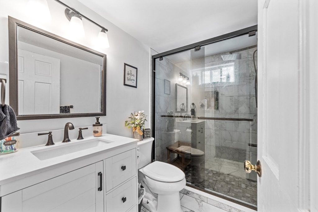 22 Eames Avenue Amherst, MA 01002 - Photo 22 of 36 a bathroom with a sink toilet and shower