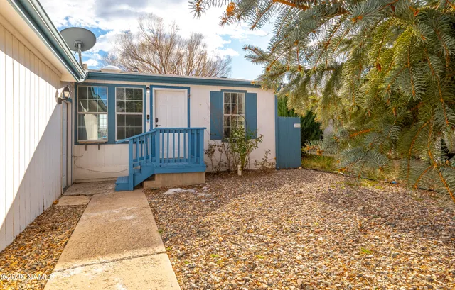 a house with trees in front of it