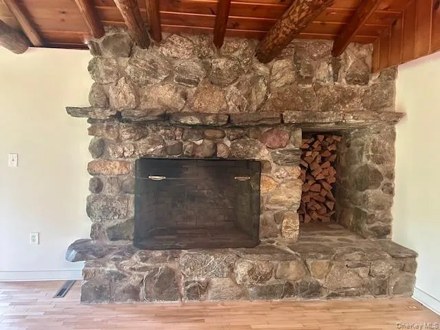 a kitchen with a refrigerator and a sink