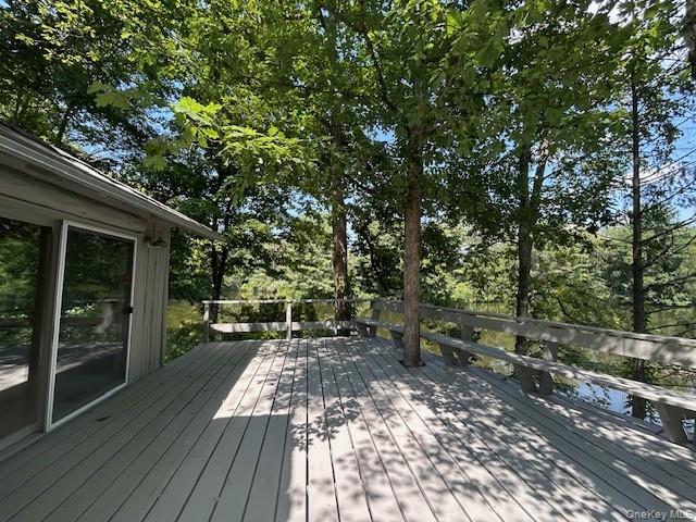 272 Drake Road Pleasant Valley, NY 12569 - Photo 7 of 43 a view of backyard with table and chairs and wooden floor