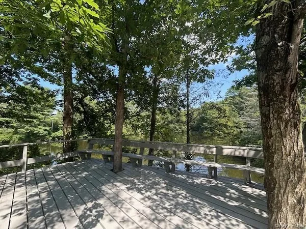 a view of a bench in a backyard