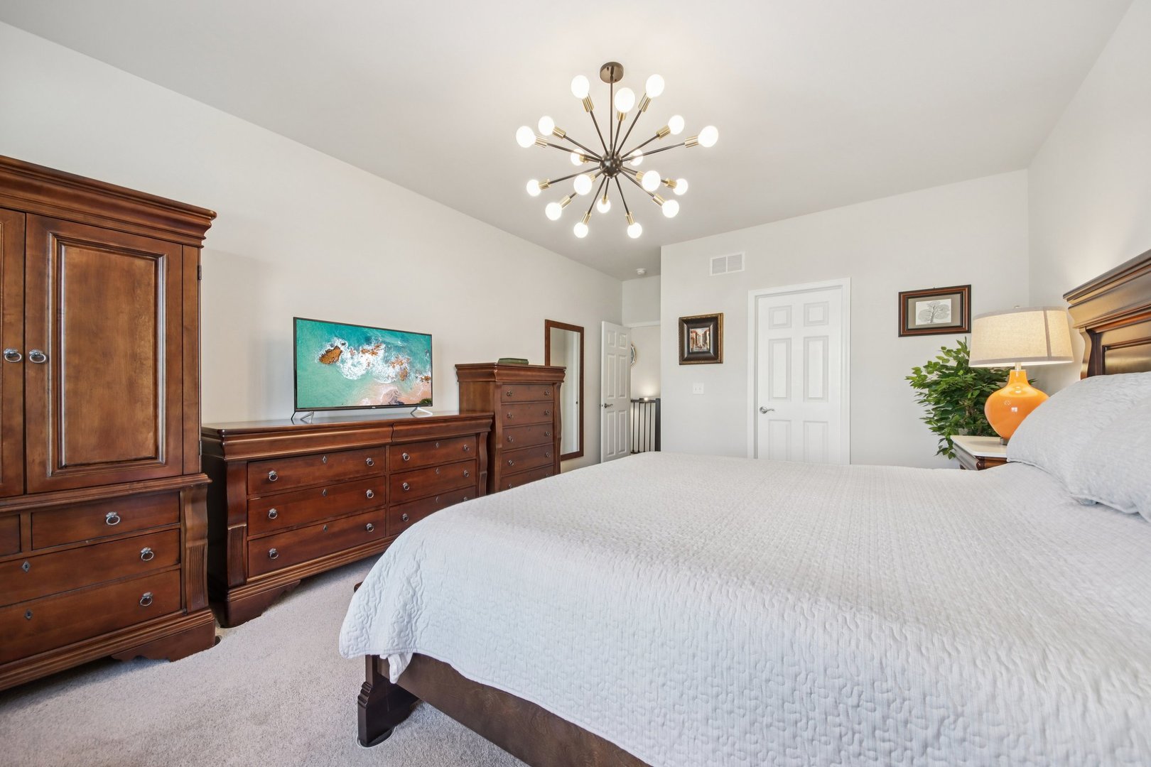 429 Fairway Lane Sycamore, IL 60178 - Photo 14 of 43 a bedroom with a bed and a dresser