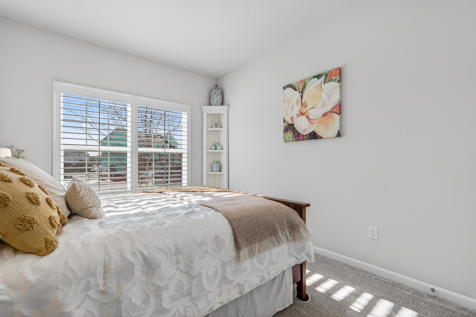 429 Fairway Lane Sycamore, IL 60178 - Photo 18 of 43 a large bed sitting in a bedroom next to a window