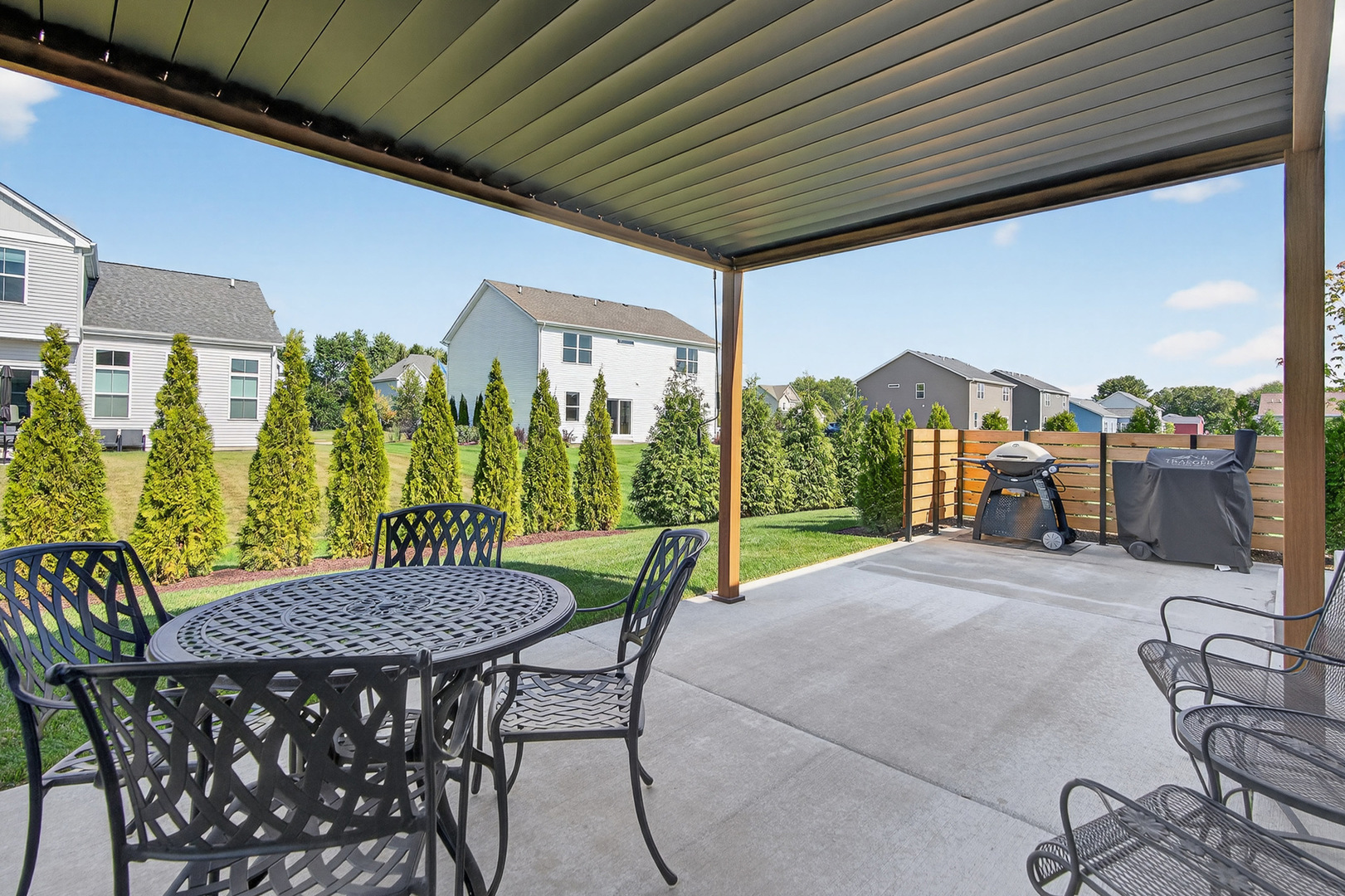 429 Fairway Lane Sycamore, IL 60178 - Photo 28 of 43 a view of a patio with a table chairs and backyard