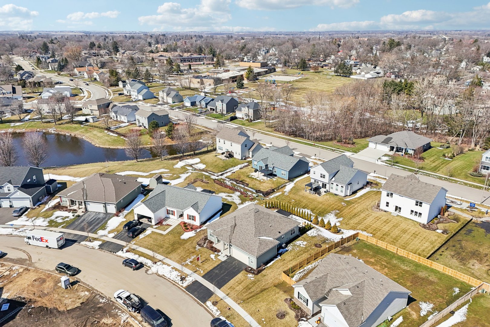 429 Fairway Lane Sycamore, IL 60178 - Photo 37 of 43 an aerial view of a house with a lake view