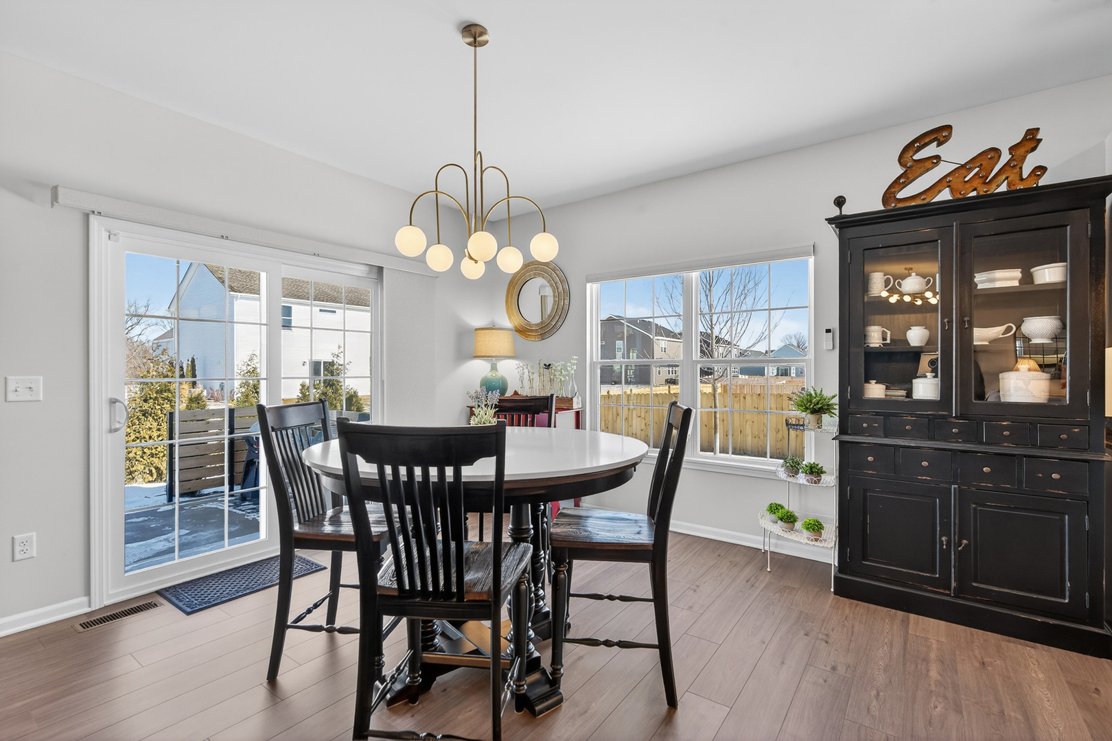 429 Fairway Lane Sycamore, IL 60178 - Photo 6 of 43 a view of a dining room with furniture window and wooden floor