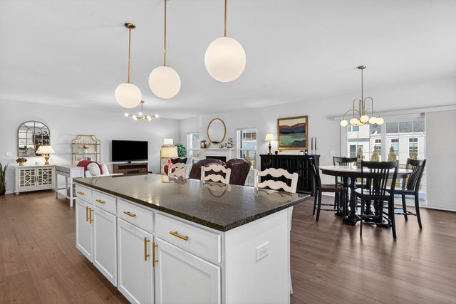 429 Fairway Lane Sycamore, IL 60178 - Photo 10 of 43 a large kitchen with a table and chairs