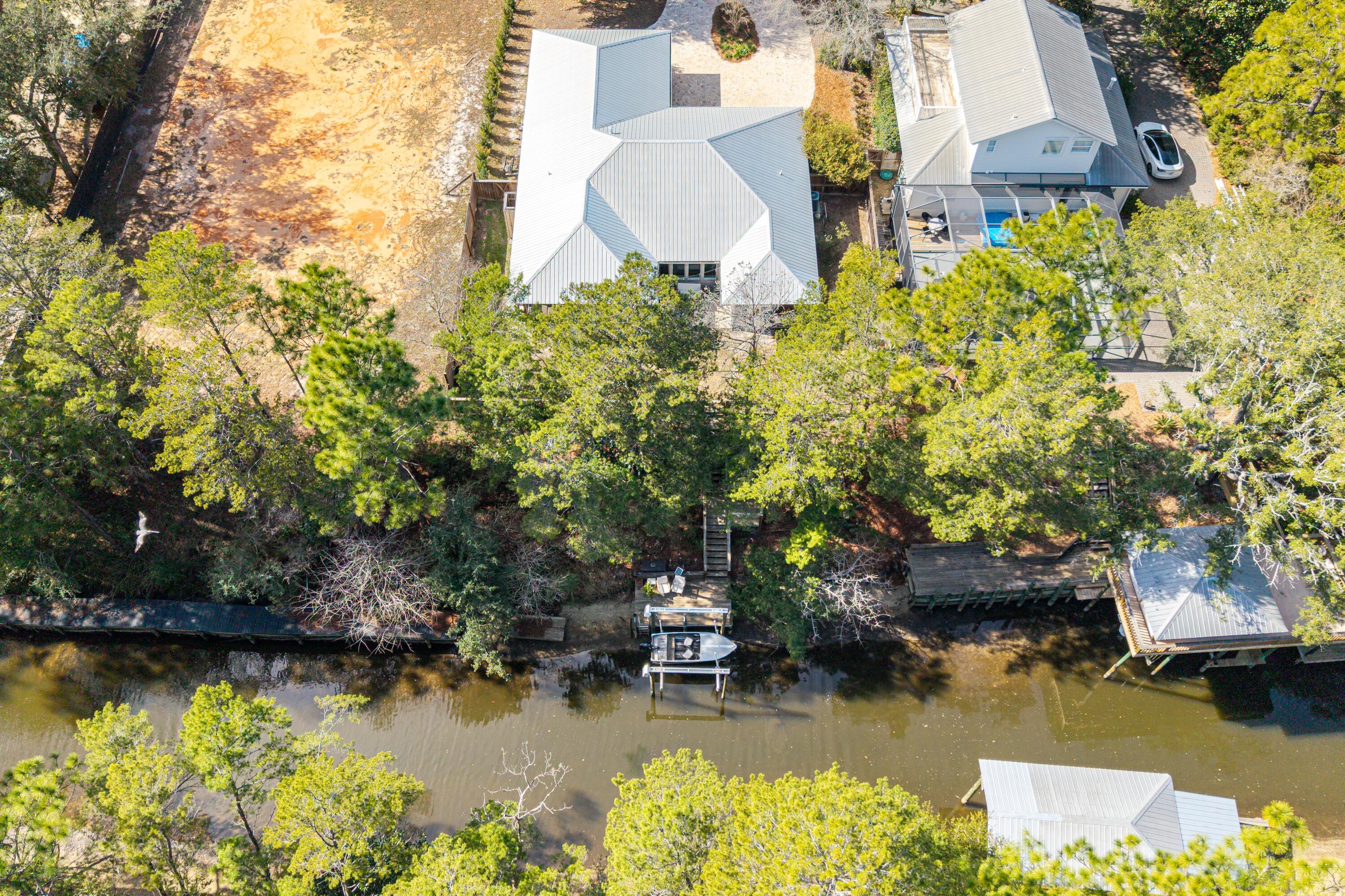 448 Ricker Avenue Santa Rosa Beach, FL 32459 - Photo 28 of 30 an aerial view of a house with a yard basket ball court and outdoor seating