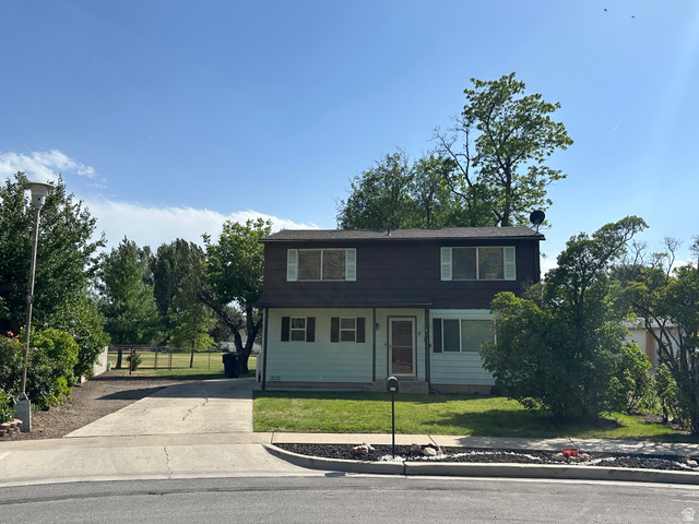 624 East Cutler Springville, UT 84663 - Photo 1 of 1 Two-story residence featuring a brown upper facade and a light green lower facade with window shutters