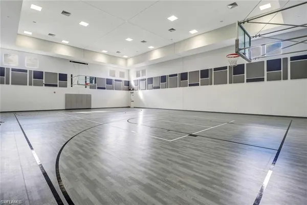 a view of a swimming pool with outdoor seating