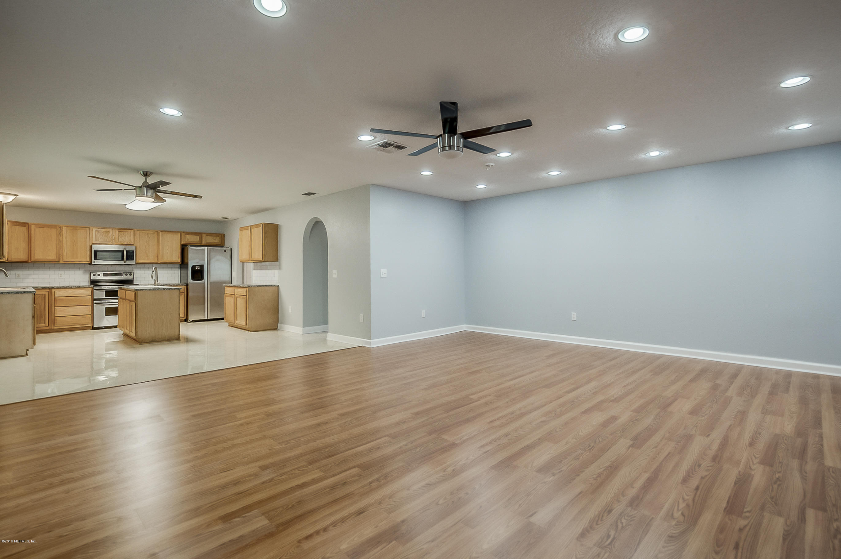 76489 Longleaf Loop Yulee, FL 32097 - Photo 13 of 29 family room