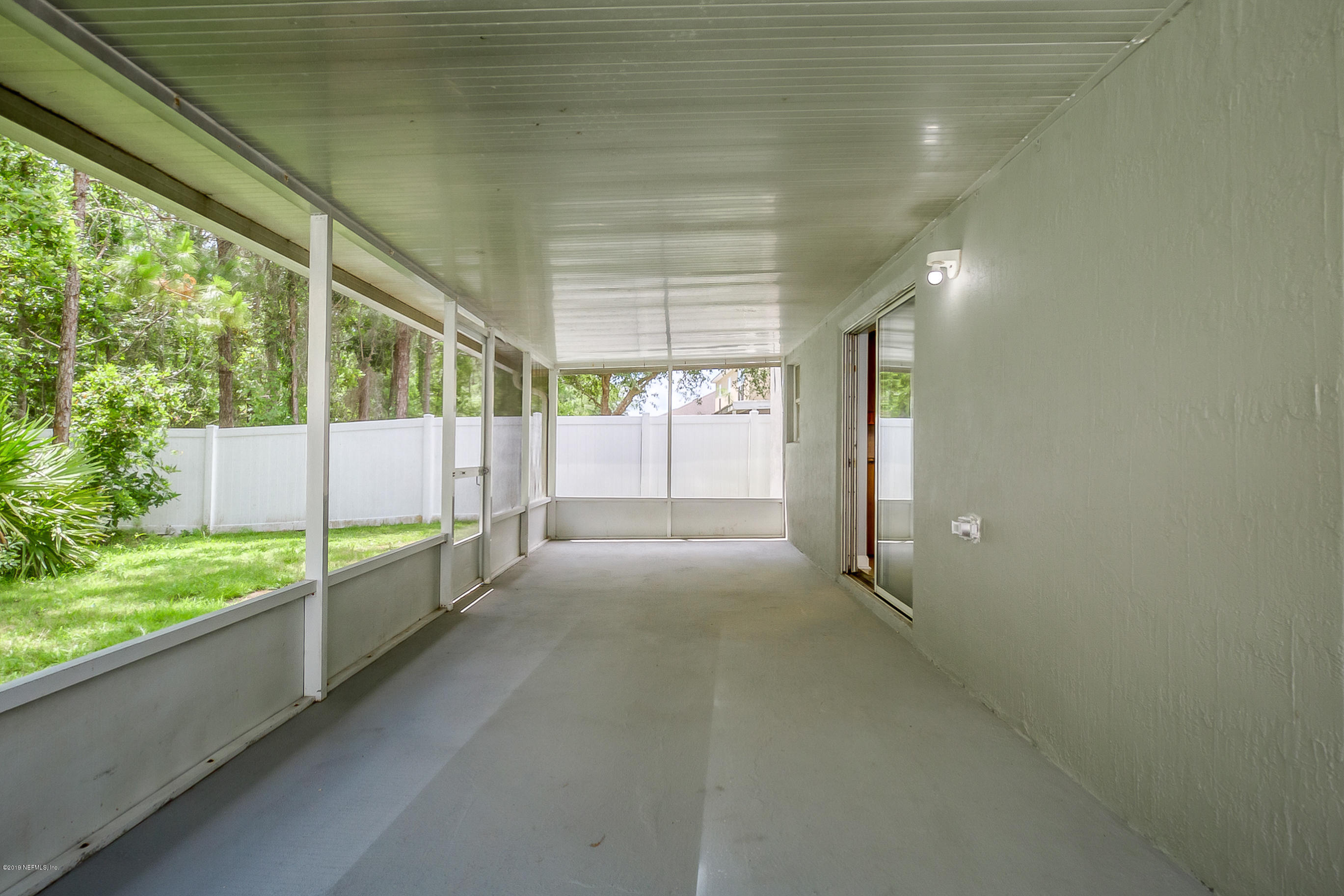 76489 Longleaf Loop Yulee, FL 32097 - Photo 23 of 29 back porch