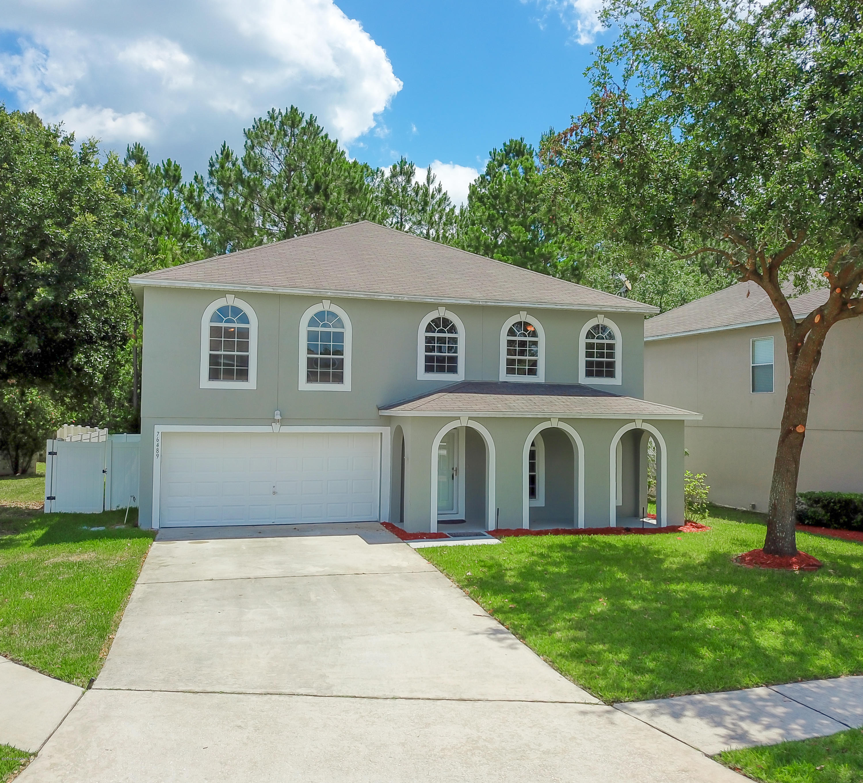 76489 Longleaf Loop Yulee, FL 32097 - Photo 27 of 29 front of home