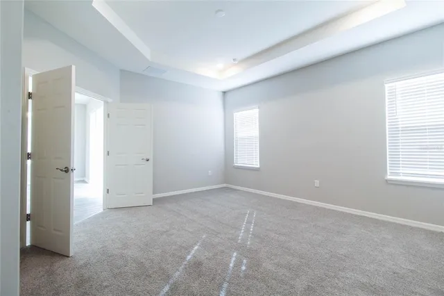 a empty closet with wooden floor