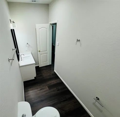 a view of entryway with wooden floor