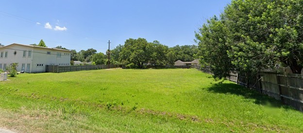 2209 Peppermill Road Houston, TX 77080 - Photo 5 of 5 a view of yard with swimming pool and green space