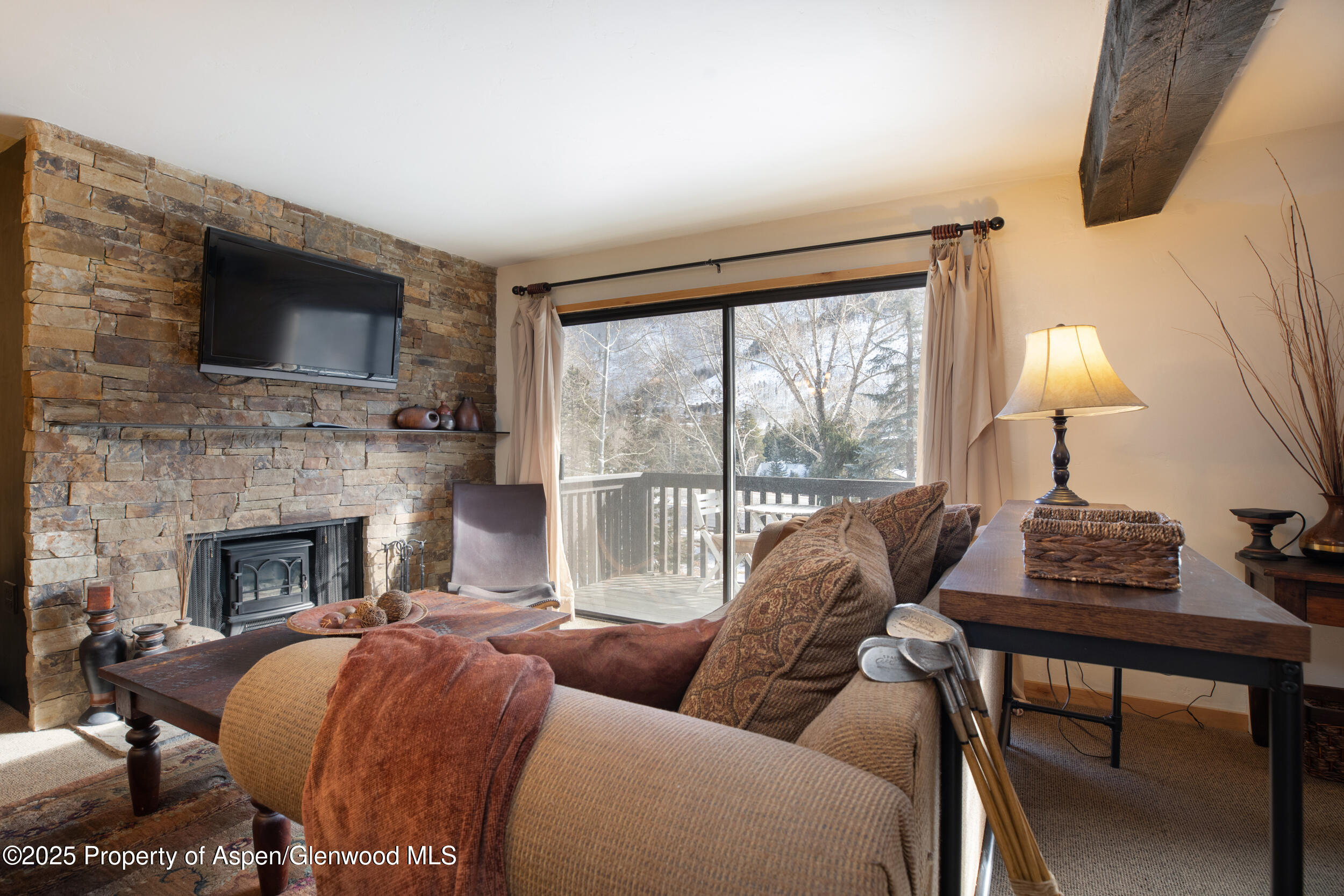 1880 Meadow Ridge Road, Unit 7 Vail, CO 81657 - Photo 2 of 12 2512_meadow_ridge_7_interior_living_b