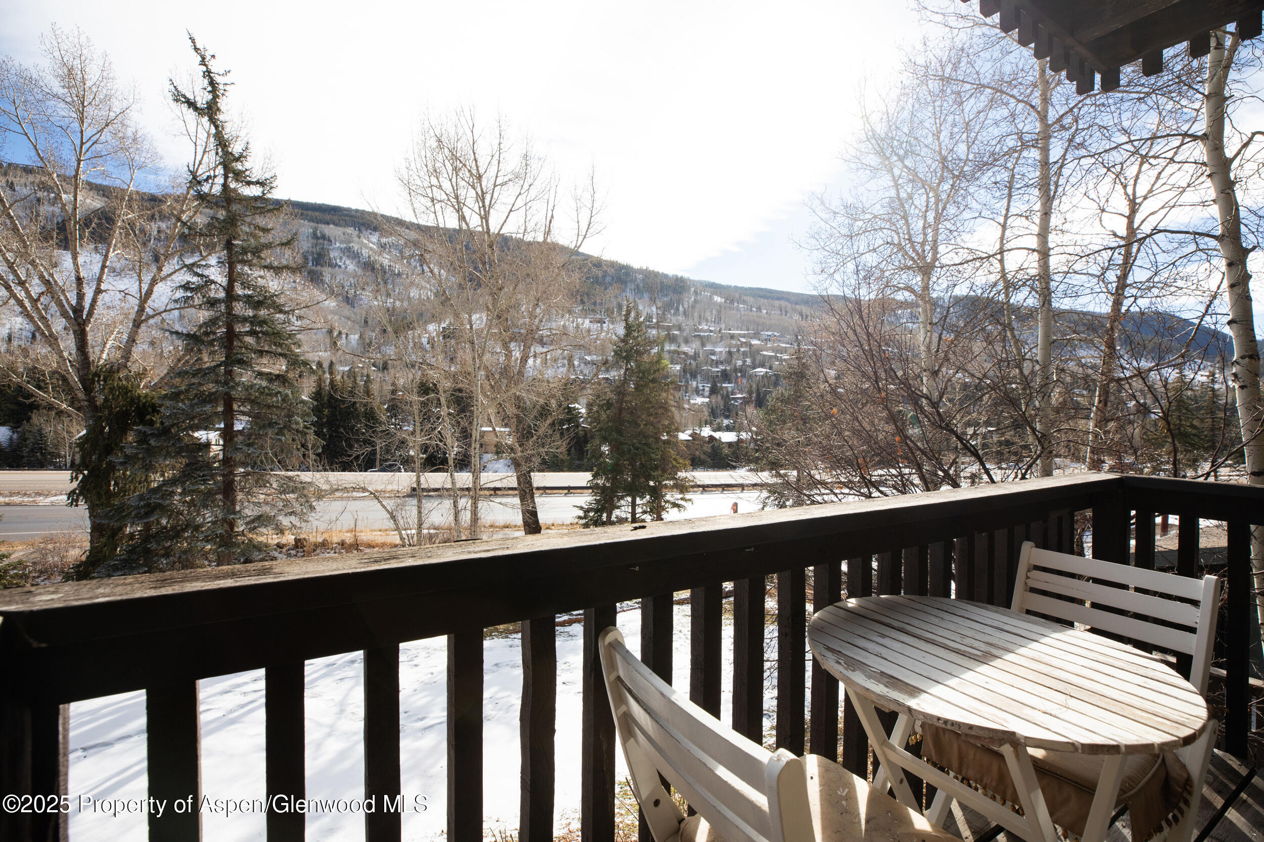 1880 Meadow Ridge Road, Unit 7 Vail, CO 81657 - Photo 4 of 12 2512_meadow_ridge_7_exterior_deck_a
