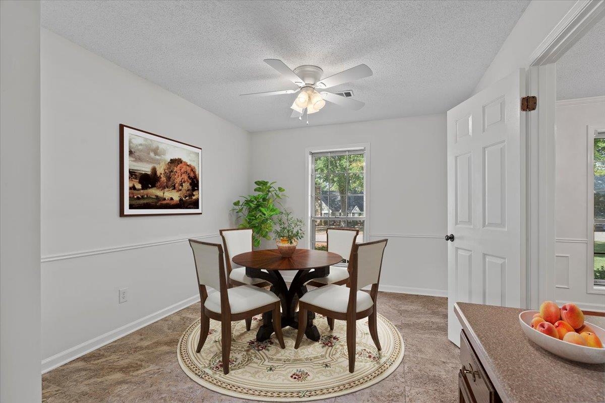 369 Taraview Road Collierville, TN 38017 - Photo 14 of 34 a dining room with furniture and window