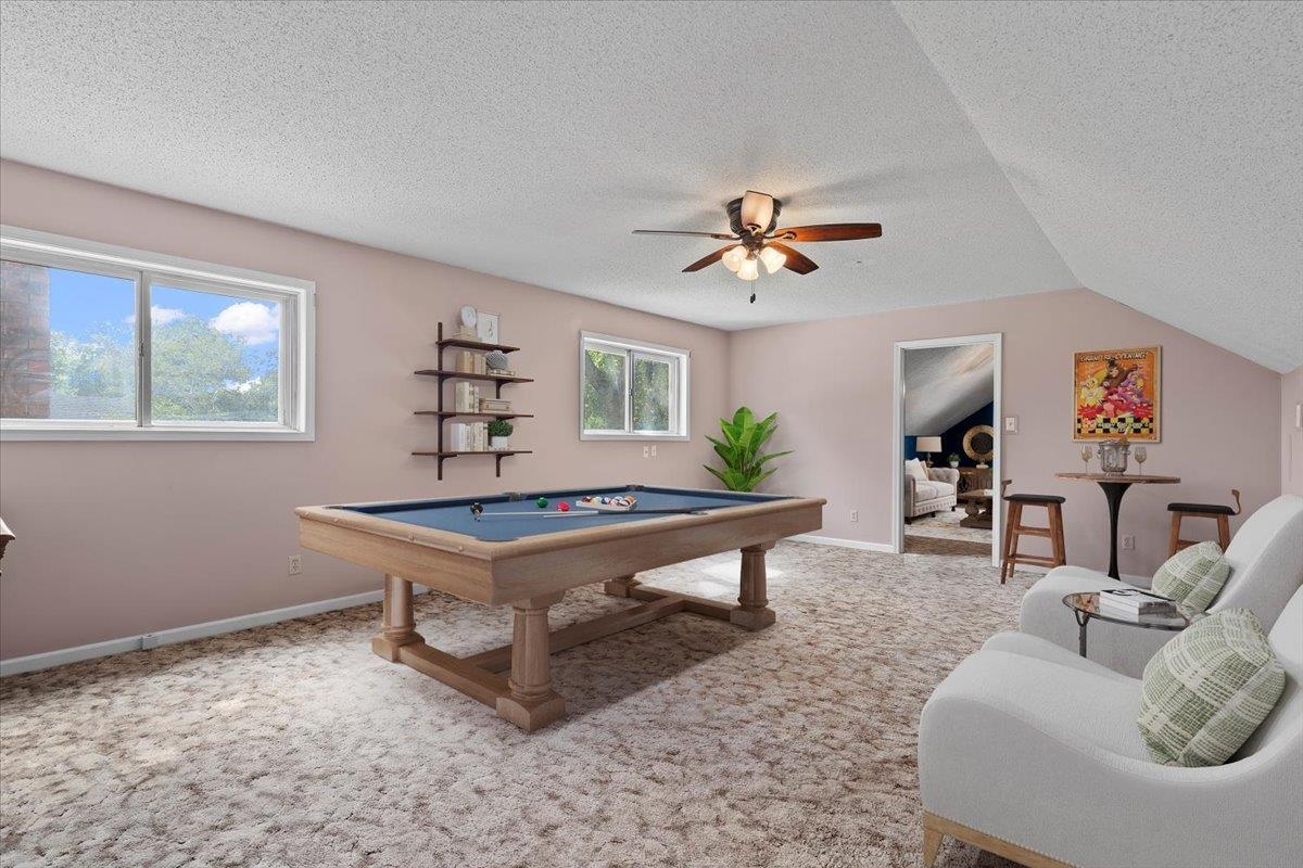 369 Taraview Road Collierville, TN 38017 - Photo 25 of 34 a living room with furniture a rug and a window