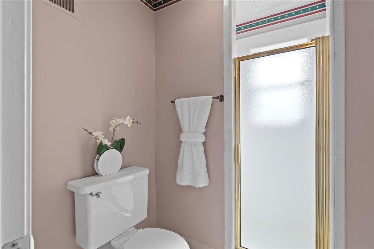 369 Taraview Road Collierville, TN 38017 - Photo 27 of 34 a bathroom with a toilet and a sink