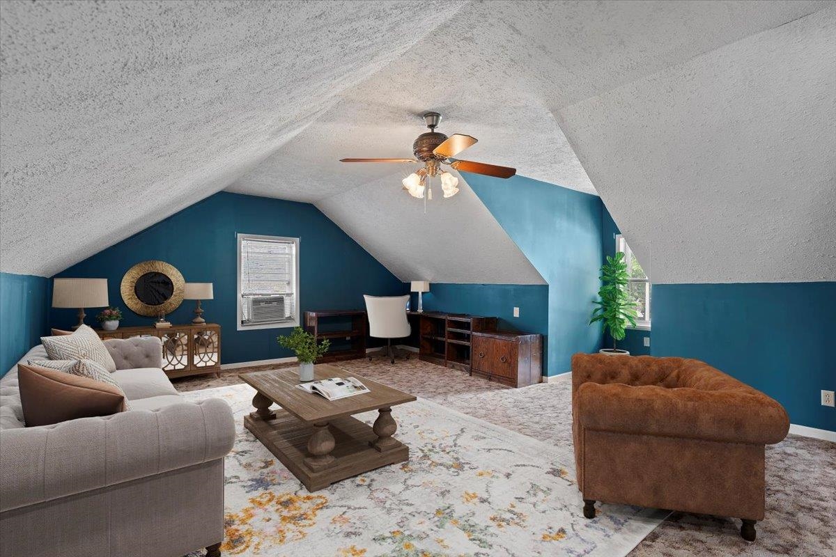 369 Taraview Road Collierville, TN 38017 - Photo 28 of 34 a living room with furniture and a fireplace